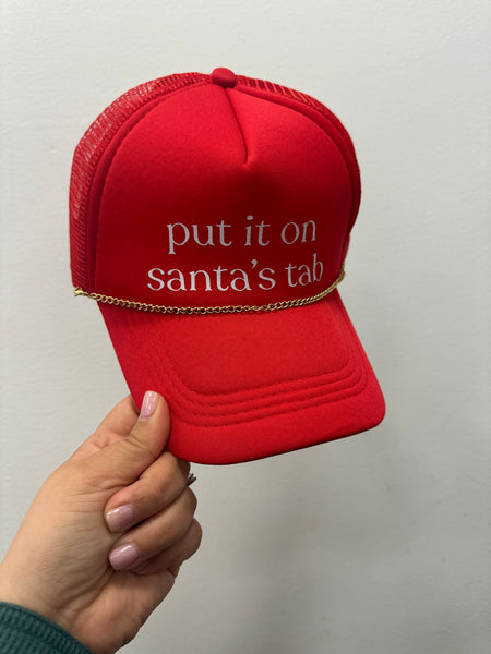 put it on Santa’s tab trucker hat