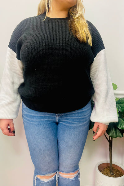 black + white sleeve sweater